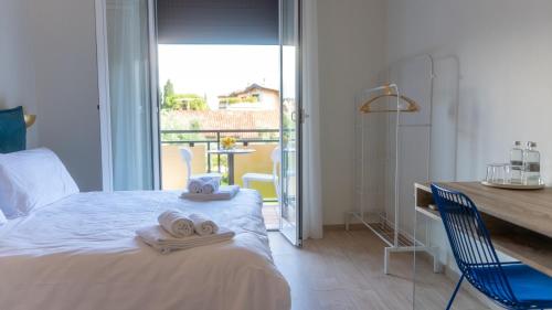 Posteľ alebo postele v izbe v ubytovaní Hotel Eden