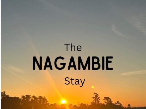 a sunset with the words the nazamble stay at The Nagambie Stay in Nagambie