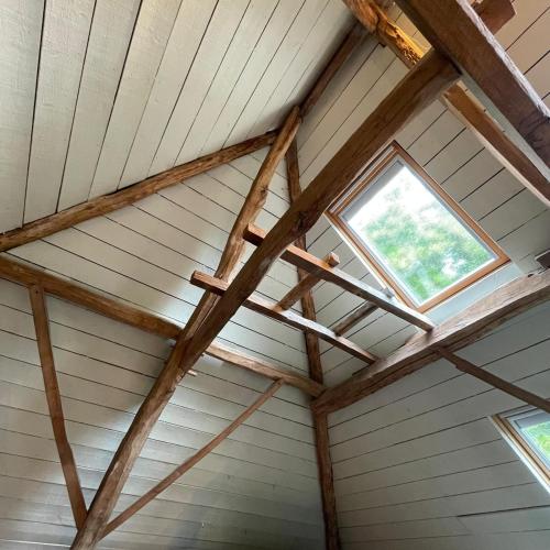 a roof of a house with a window at The Cottage in Merelbeke