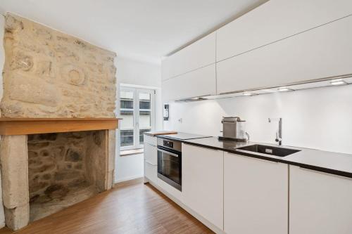 Η κουζίνα ή μικρή κουζίνα στο Modern 1BR Apartment in UNESCO Grund, Luxembourg