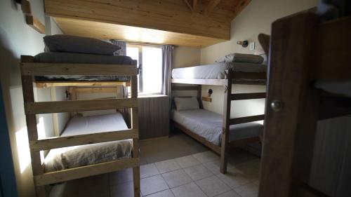 Letto o letti in una camera di America Del Sur Calafate Hostel