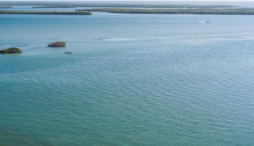 an aerial view of a large body of water at Addison Opulence in Marco Island