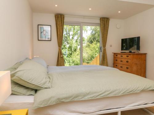 Una cama o camas en una habitación de Valise
