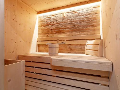 a sauna with a cup of coffee in it at Apart33 Top 2-13 in Haus im Ennstal