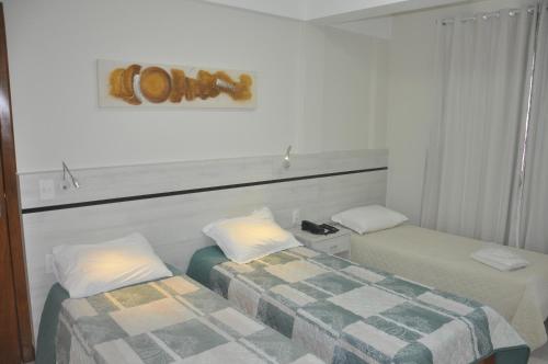 Postel nebo postele na pokoji v ubytování Hotel Raio de Sol
