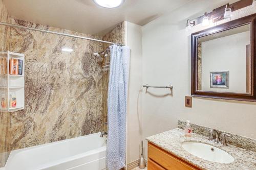 a bathroom with a sink and a shower at Near Downtown and Fishing Anchorage Escape! in Anchorage