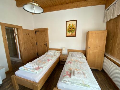 Postel nebo postele na pokoji v ubytování Apartmany Moravienka