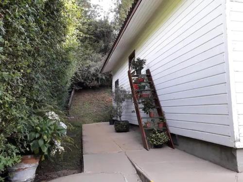 En have udenfor Pousada Florada na Serra - Apto 6