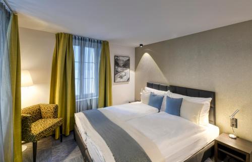Katil atau katil-katil dalam bilik di Boutique Hotel Reiser