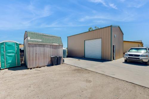 a car parked next to two garages and a building at Nonpariel Escape in Paso Robles