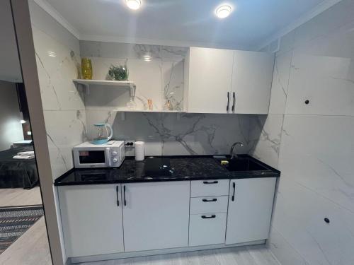 Køkken eller tekøkken på Алиханова 10А