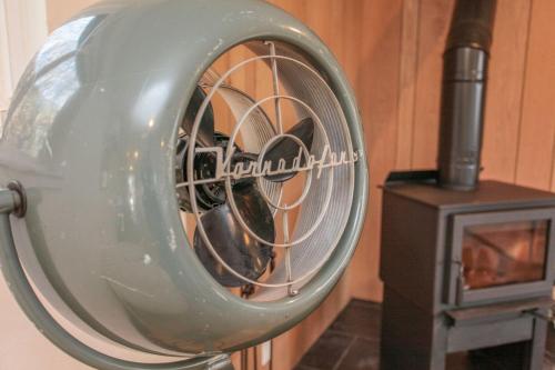 a close up of a fan next to a stove at The Holiday Rambler in Livingston