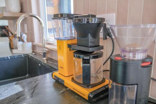 a blender sitting on a counter in a kitchen at The Holiday Rambler in Livingston