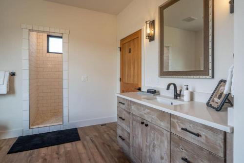 a bathroom with a sink and a mirror at Double MM Ranch in Emigrant