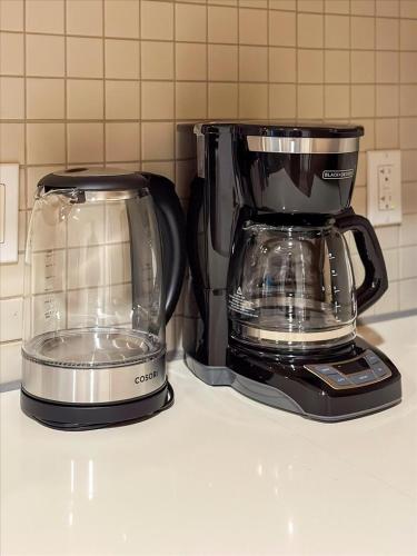 a toaster and a blender sitting on a counter at Cozy 1BR apt in Hollywood w Pool, Gym and Parking in Los Angeles