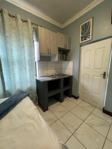 Katil atau katil-katil dalam bilik di Michu Guest house