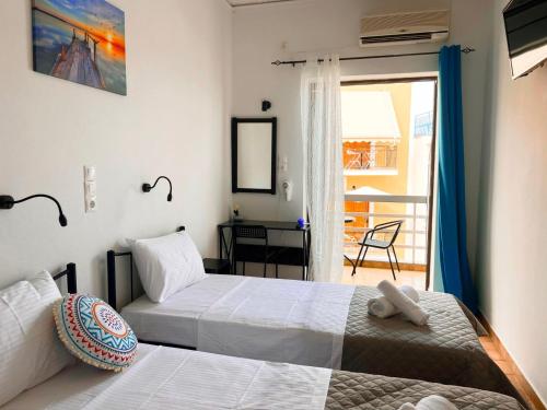 Postel nebo postele na pokoji v ubytování Hotel Liliana