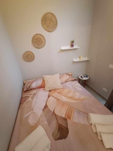 Ένα ή περισσότερα κρεβάτια σε δωμάτιο στο Maison La Reggia