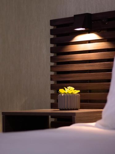 Postel nebo postele na pokoji v ubytování Hotel Encanto