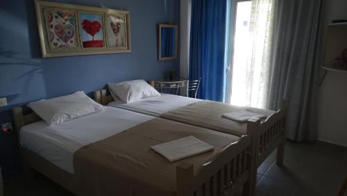 Postel nebo postele na pokoji v ubytování Blue Dreams