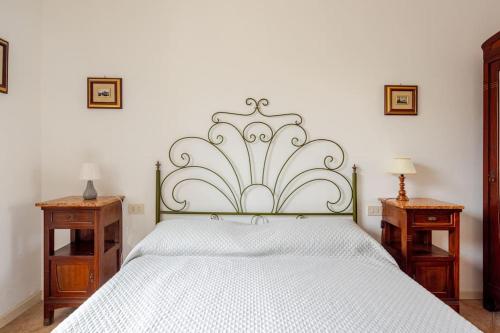 Katil atau katil-katil dalam bilik di Spaziosa casa con giardino e dependance