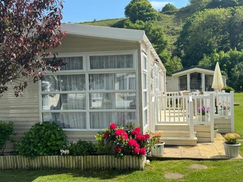 Κήπος έξω από το Cardigan Bay Holidays