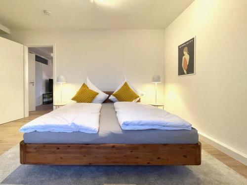 Spacy Tracy, dein feinzeit Apartmentにあるベッド