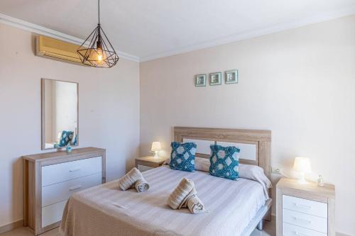 Postel nebo postele na pokoji v ubytování La Perla Playa Apt Dream Homes Tenerife