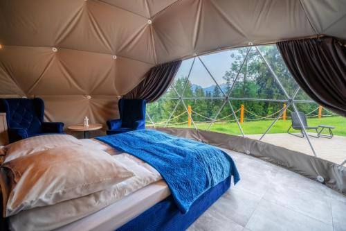 Letto o letti in una camera di Diamond Glamp & Jacuzzi