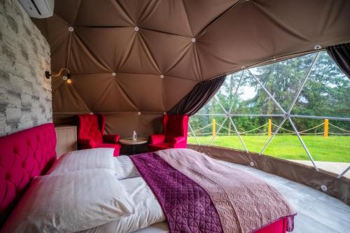 Letto o letti in una camera di Diamond Glamp & Jacuzzi