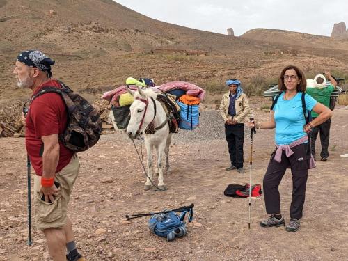 a group of people standing next to a horse at Atlas Views in Imlil