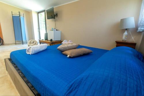 Postel nebo postele na pokoji v ubytování Stefano house