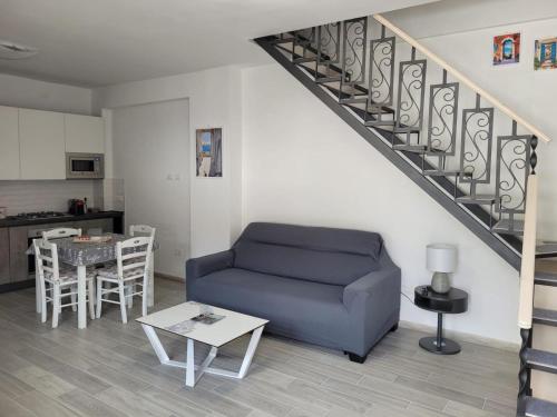 Et opholdsområde på Cozy Corner Apartment Forio