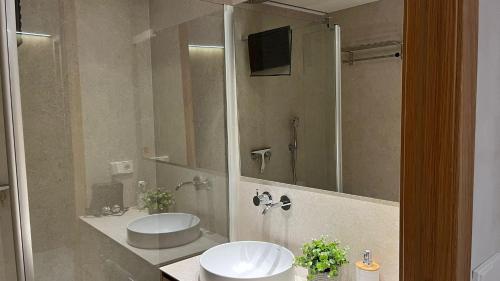 Ένα μπάνιο στο Apartamento Colon