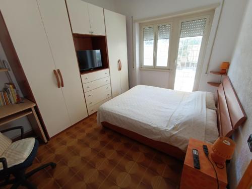 Postel nebo postele na pokoji v ubytování Casa Alessandra