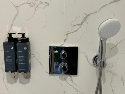 a bathroom counter with a hair dryer and a blow at Southgate Luxury Apartments-Jaquzzi Bath-Private Parking- 2 Min M62 in Elland