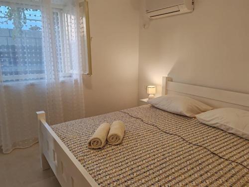 En eller flere senge i et værelse på Apartments by the sea Lumbarda, Korcula - 4378