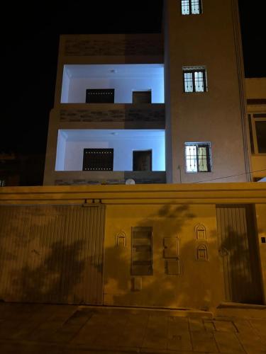 a building at night with a light on it at Guest house DAR Al YASMINA in Tunis