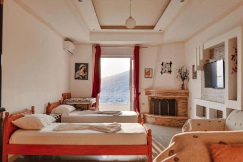 Televiisor ja/või meelelahutuskeskus majutusasutuses Villa Kaso