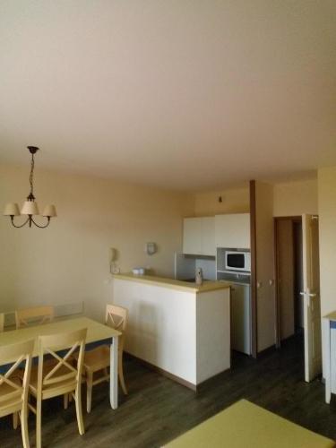 Η κουζίνα ή μικρή κουζίνα στο Appartement Les Sables Blancs