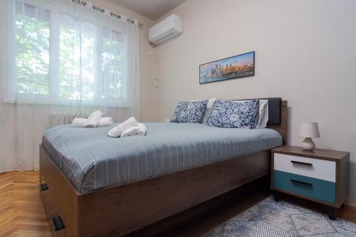 Voodi või voodid majutusasutuse Spacious Sofia Condo - Philadelphia LOVE toas