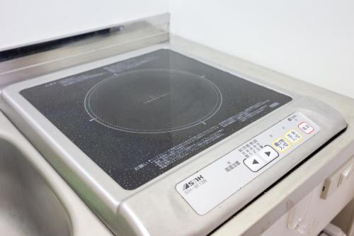 Η κουζίνα ή μικρή κουζίνα στο ハイクレスト中野201