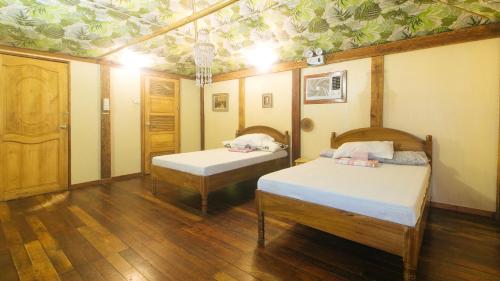 Katil atau katil-katil dalam bilik di The Clara Beach and Guest House