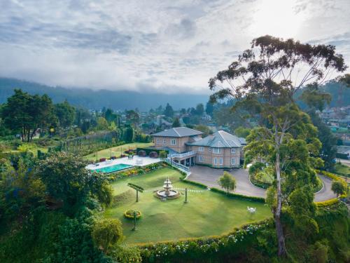an aerial view of a house with a garden at The Westbury Palace in Nuwara Eliya