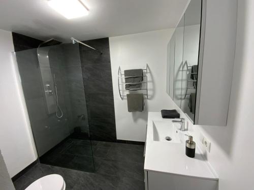 Koupelna v ubytování Apartment Business