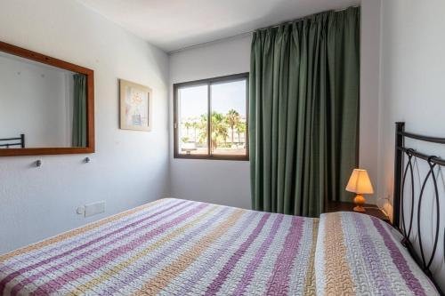 Posteľ alebo postele v izbe v ubytovaní Cozy 2b Apt By The Beach By Dream Homes Tenerife