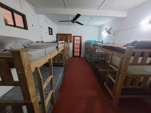 Postel nebo postele na pokoji v ubytování Casa Perla