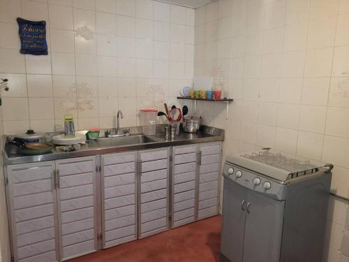 Kuchyň nebo kuchyňský kout v ubytování Casa Perla