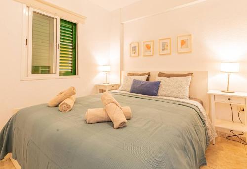 Postel nebo postele na pokoji v ubytování Playa Arena Beach Apt By Dream Homes Tenerife