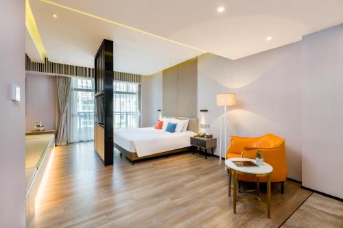 Katil atau katil-katil dalam bilik di Xiamen Lujiang Mingjia Hotel